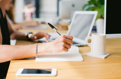 A female working at her desk