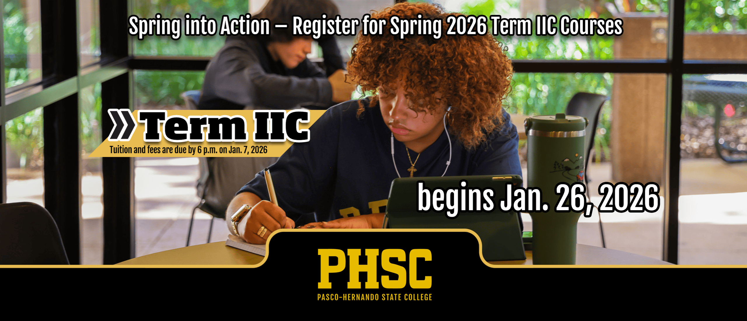 Student studying with text: Spring into Action - Register for Spring 2026 Term IIC Courses. Tuition and fees are due by 6 p.m. on Jan 7, 2026. Classes Begin Jan. 26, 2026