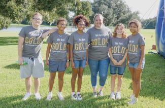 Six multi-diverse students posing