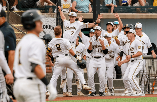 Men's baseball team celebrate their semi-final win.