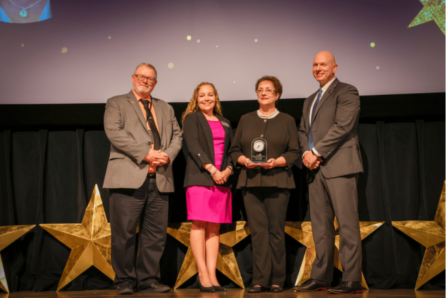Dennis Feltwell, Vice President Enrollment Management and Student Sevices; Michelle Bullwinkel, Director Alumni and Donor Relations; Jody Jones, Distinguished Alumna of the Year and Eric Hall, Ed.D., PHSC President