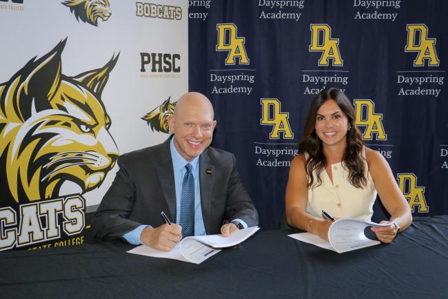 Eric Hall, Ed.D., president, PHSC and Tarah Savino, the board vice chair, Dayspring Academy