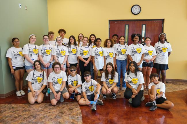 A group portrait of twenty-four students at the PHSC Porter Campus at Wiregrass.